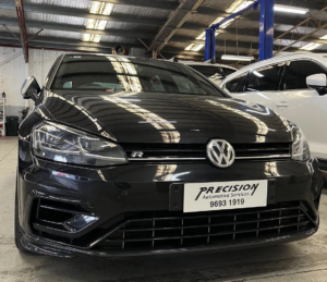 VW specialist mechanic in Rosebery performing a logbook service and ODIS diagnostic scan on a Volkswagen Golf.